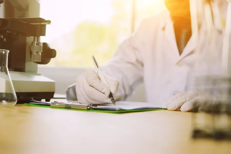 Lab Technician Making Note, Documenting