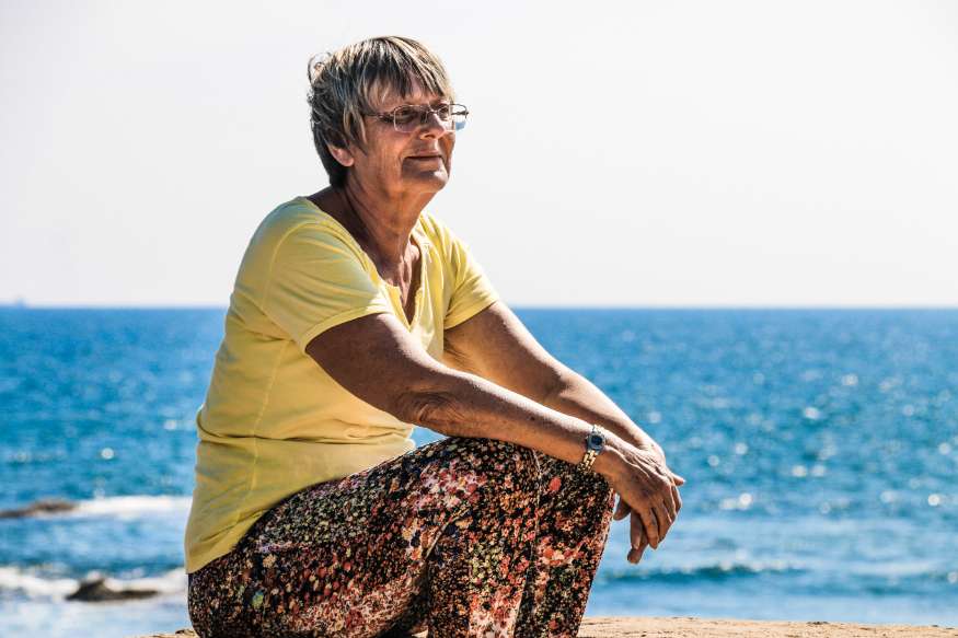 Woman By The Ocean