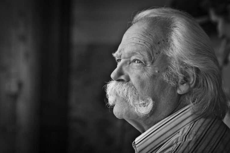 Older gentleman with a mustache grown out for Movember
