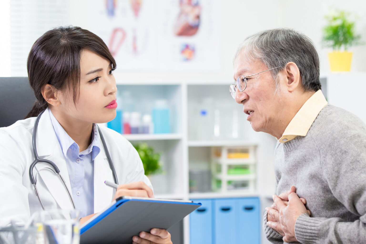 Older gentleman seeing his doctor to discuss the symptoms he has been experiencing