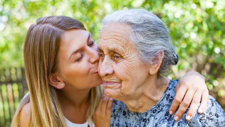 Granddaughter spends time with her grandmother that is struggling with Alzheimer's