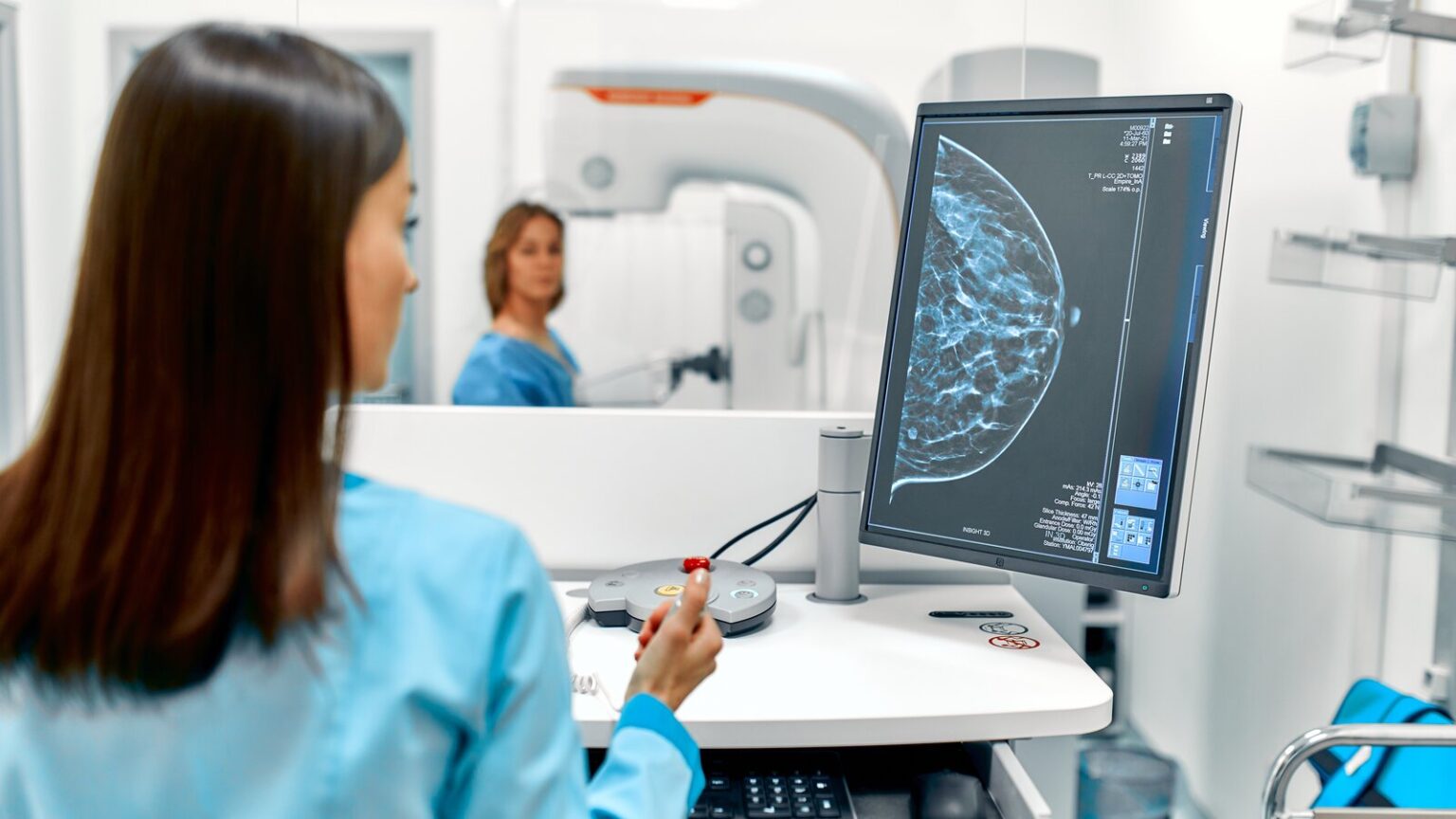 Woman getting her annual mammogram done at her local screening center